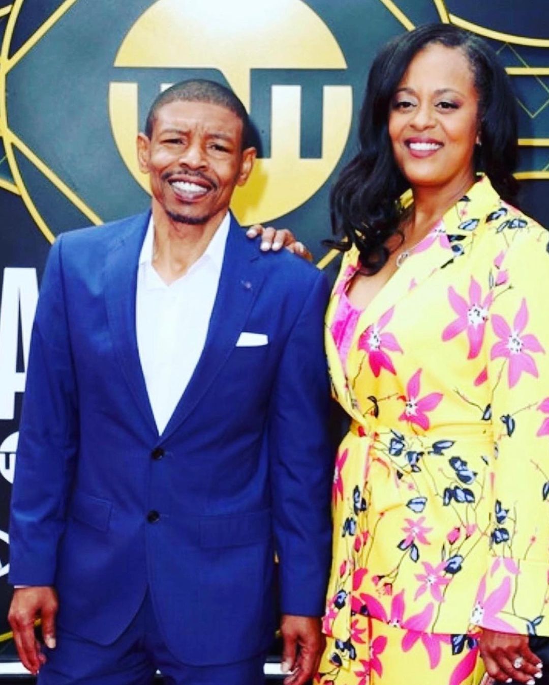 Muggsy Bogues With His Wife