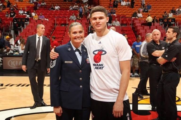 Tyler Johnson with his mother, Jennifer