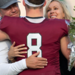 Alison And Kirk Congratulating Their Son