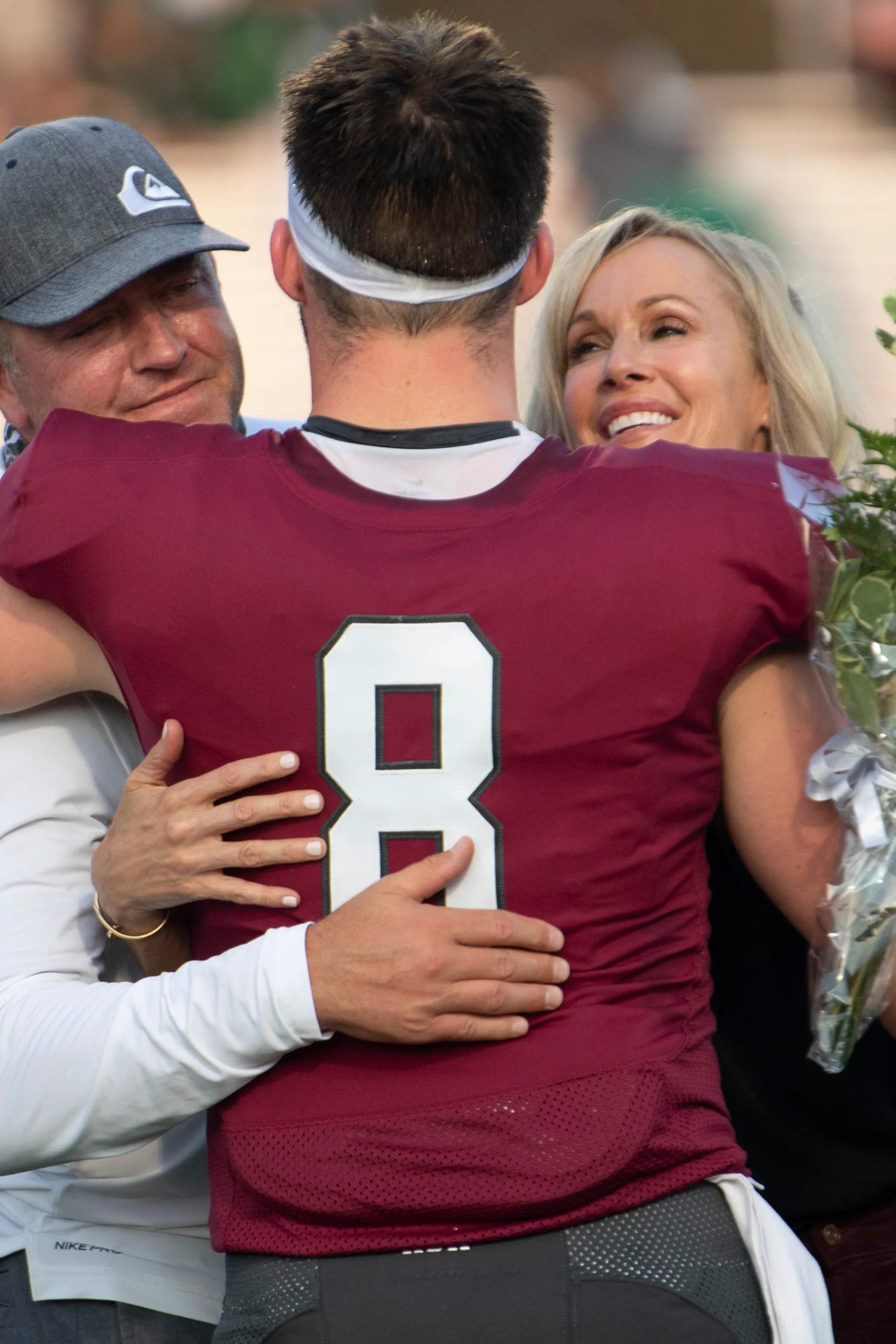 Alison And Kirk Congratulating Their Son