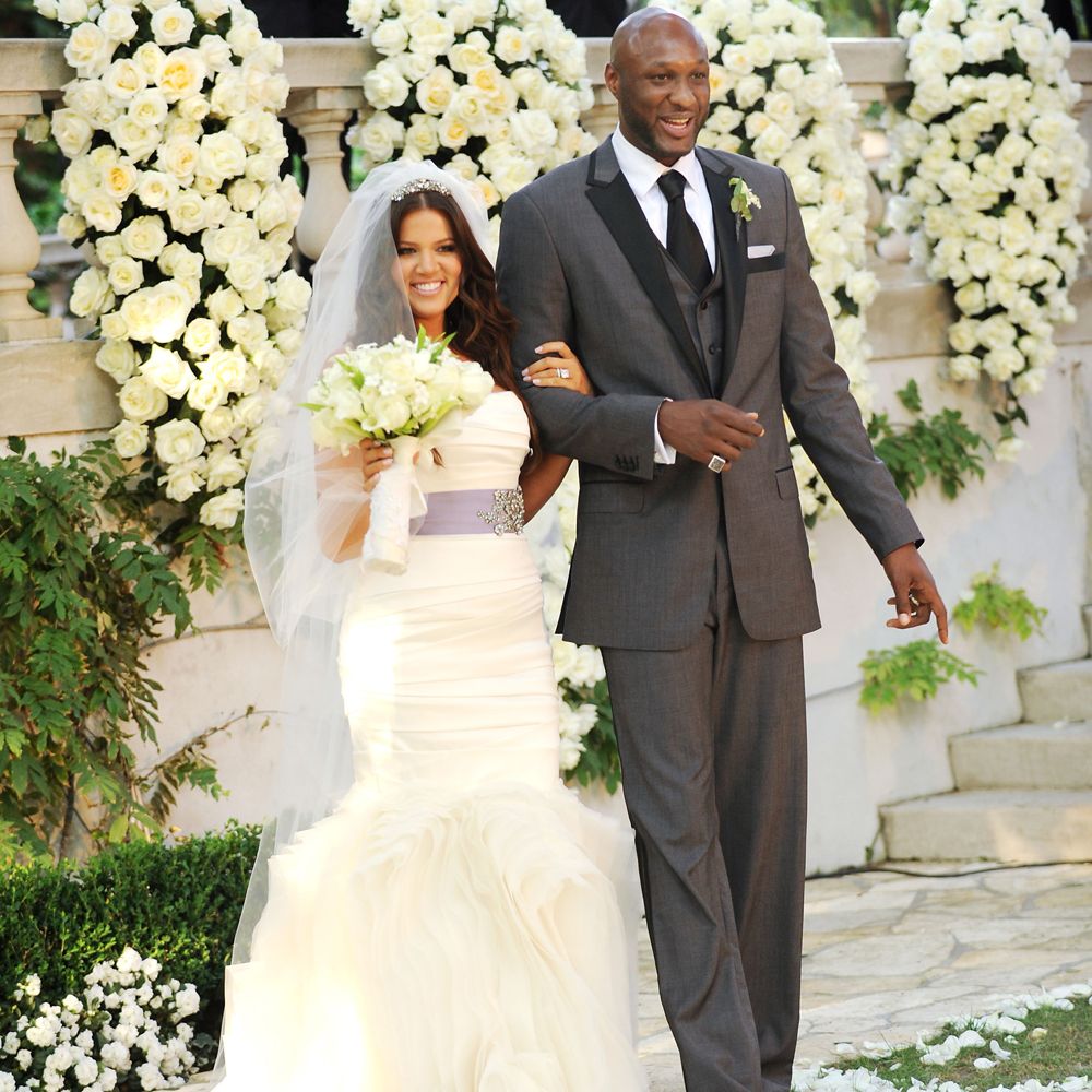 Khloe Kardashian and Lamar Odom in their wedding dress during the ceremony