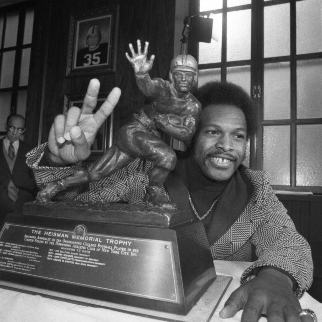 Archie Griffin with his heisman trophy (Source Land grant holy land)