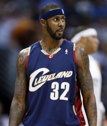 Former NBA star with his tatoo (Source Ikilo blog)