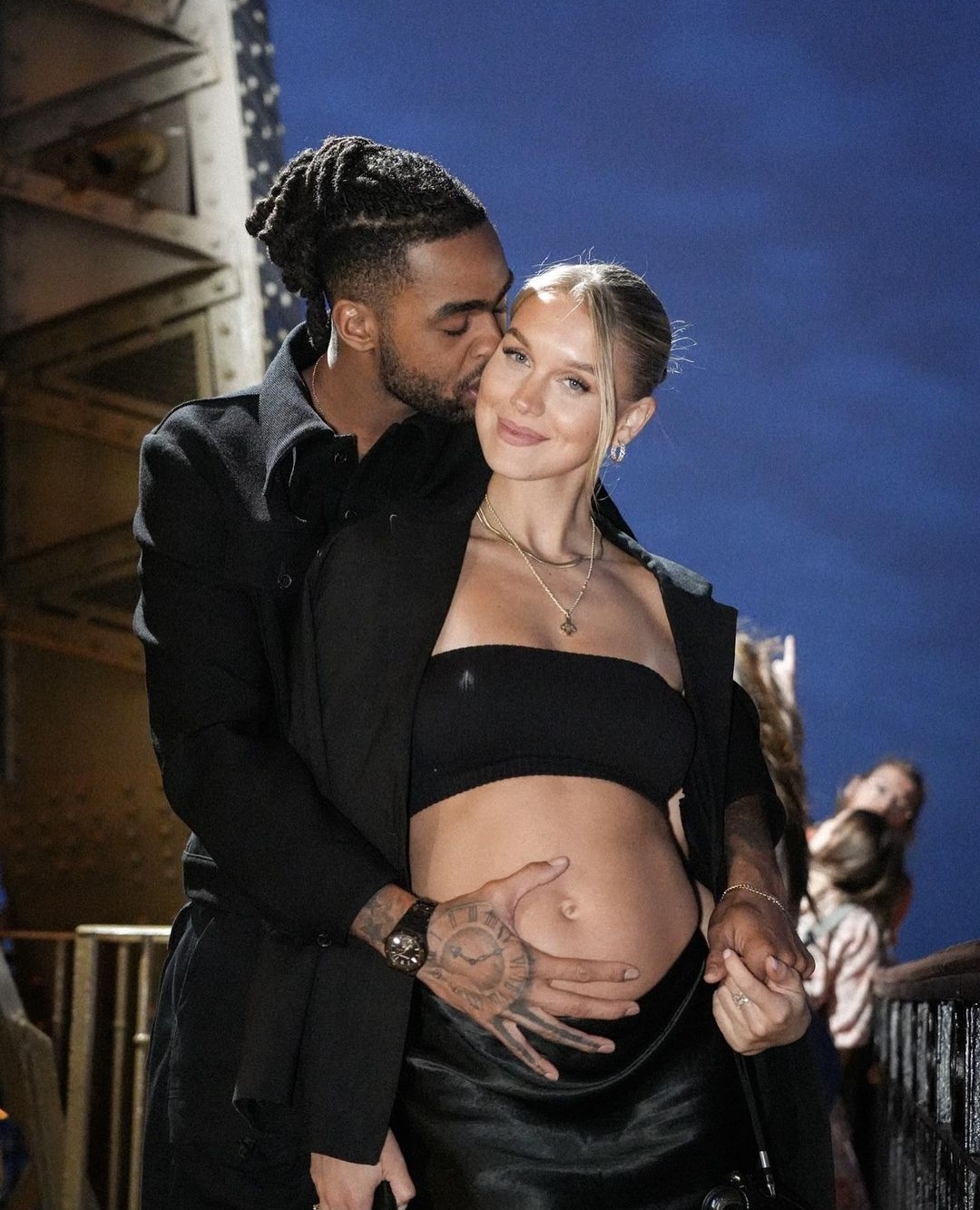Laura is pregnant with Russell's child