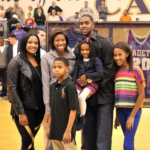 NBA player Larry Hughes with his wife and children (Source Bloximages)
