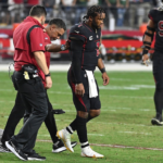 kyler-murray-walking-off-the-field-after-injury