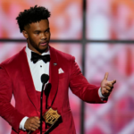 murray-receiving-award-for-nfl-offensive-rookie-of-the-year