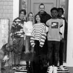 The Boone Family Wishing Happy Christmas