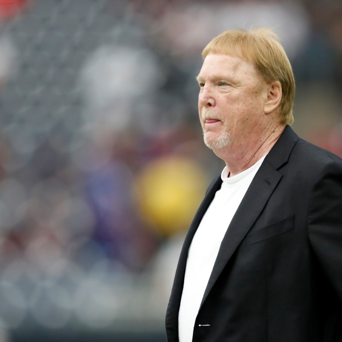 Raiders owner Mark Davis drives a 1997 Dodge Caravan