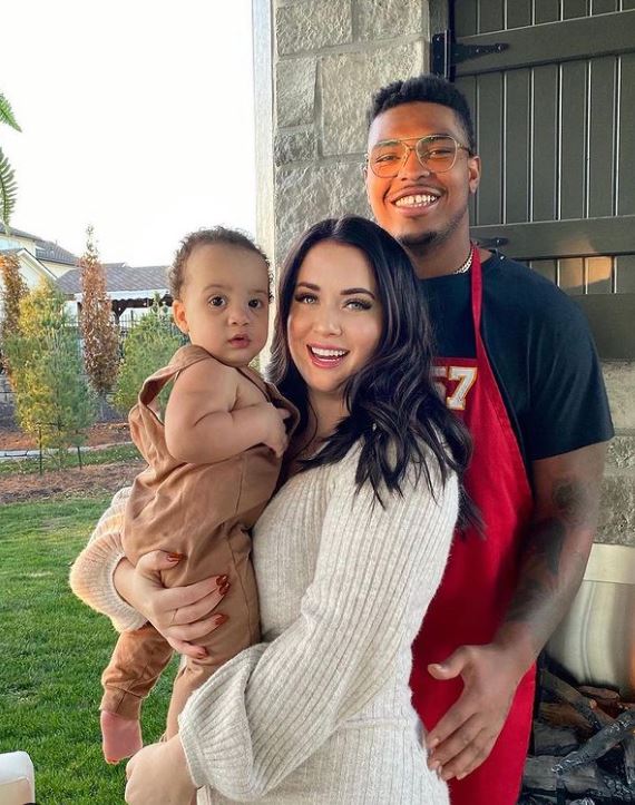 Orlando Brown with his wife and child