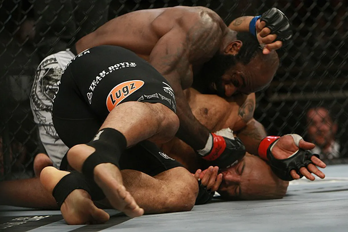 Kimbo Slice pinning Houston Alexander during the fight