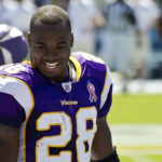 Adrian Peterson playing for the Vikings
