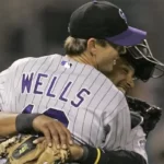 Colorado Rockies’ Yorvit Torrealba hugs Kip Wells after the Rockies beat the San Diego Padres, 2008