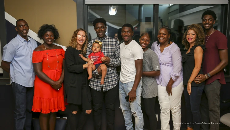 from left to right Shawn Holiday, Toya Holiday, Lauren Cheney, Tyler Holiday, Jrue Holiday, Aaron Holiday, Lauren Holiday, Shekinah Holiday, Justin Holiday (Source:: NBA family Fandom.com)