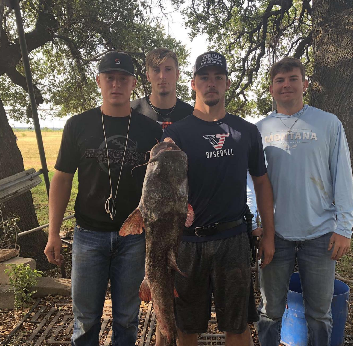 Kimble fishing with his friends