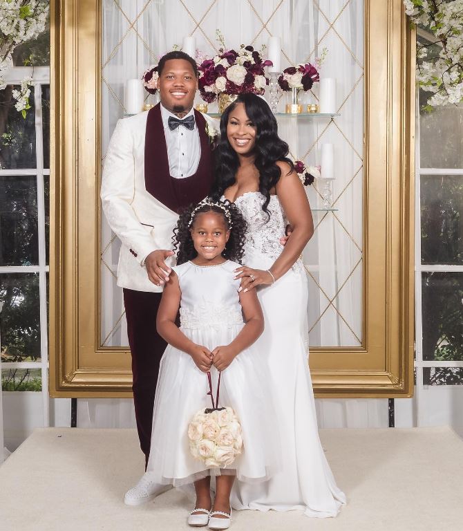 Preston Smith with his wife and daughter