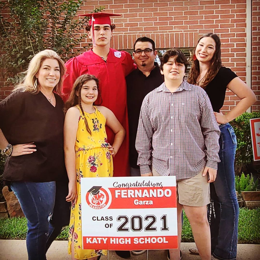 Fernando Garza with his family on high school graduation day (Source: Instagram)