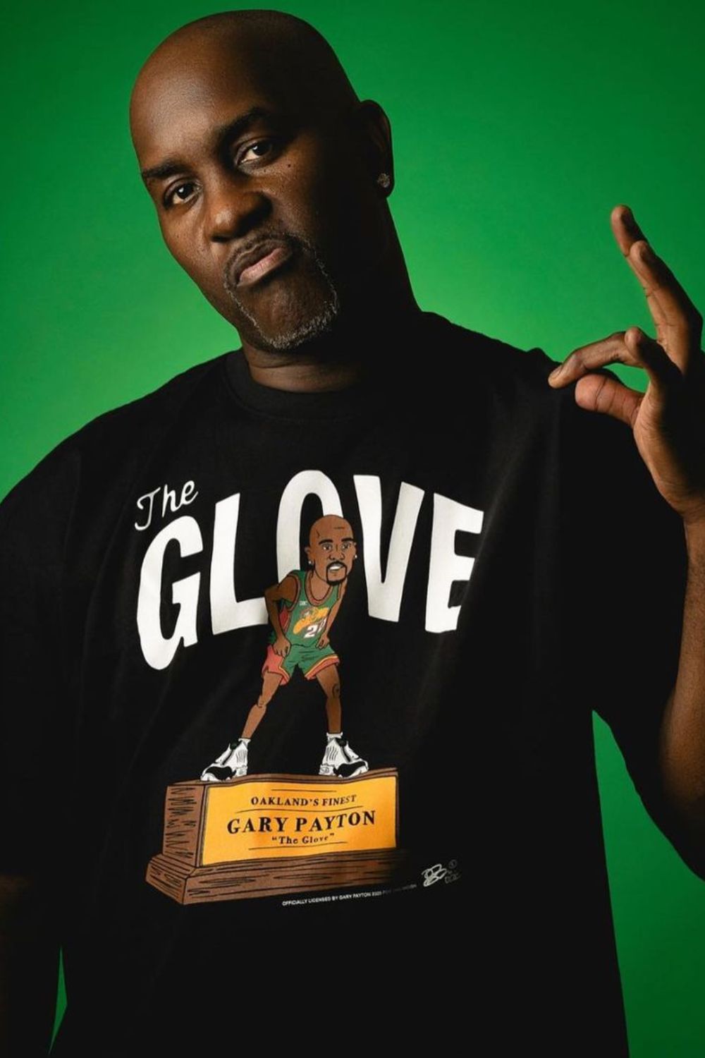 Gary Payton Posing In A Black T-Shirt