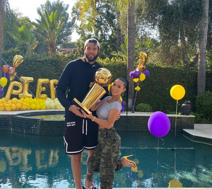 JaVale McGee And His Girlfriend Giselle Ramirez Posing With Trophy