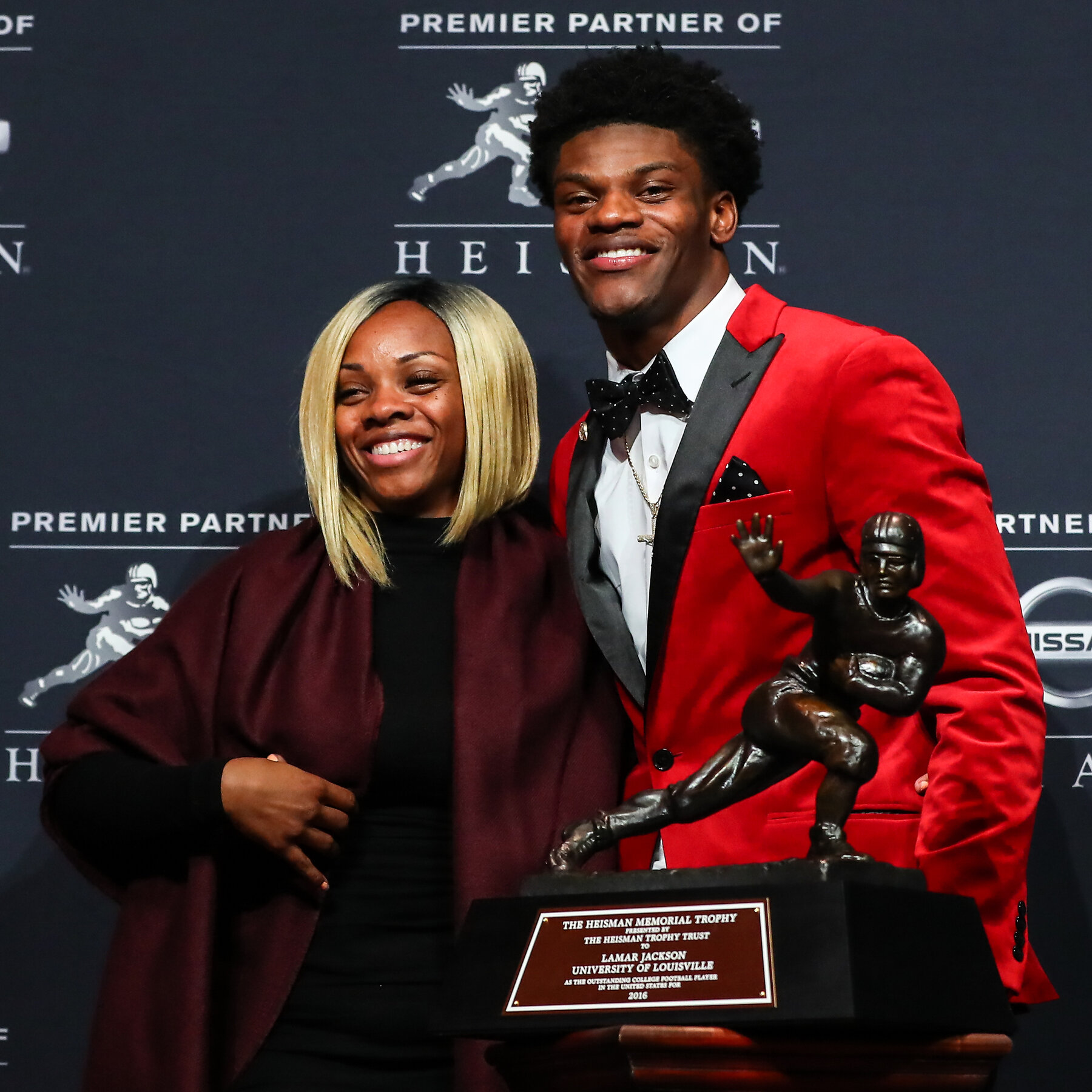 Lamar with his mother, Felicia