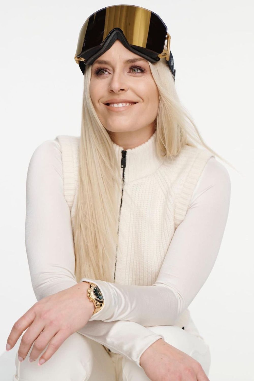 Lindsey Vonn Posing With Ski Glass 