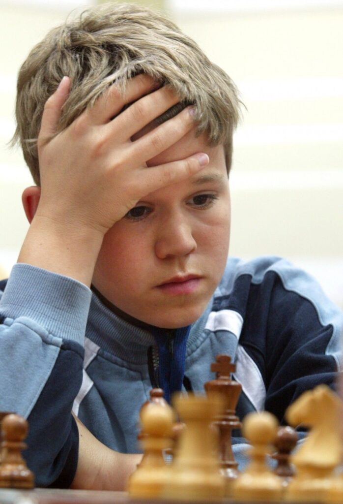 Magnus-Carlsen-playing-chess-during-childhood