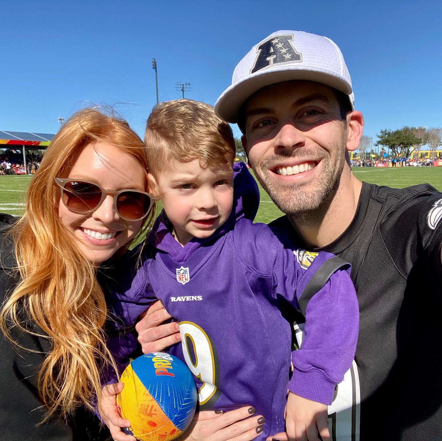 Amanda Bass with her husband, Justin Tucker and son