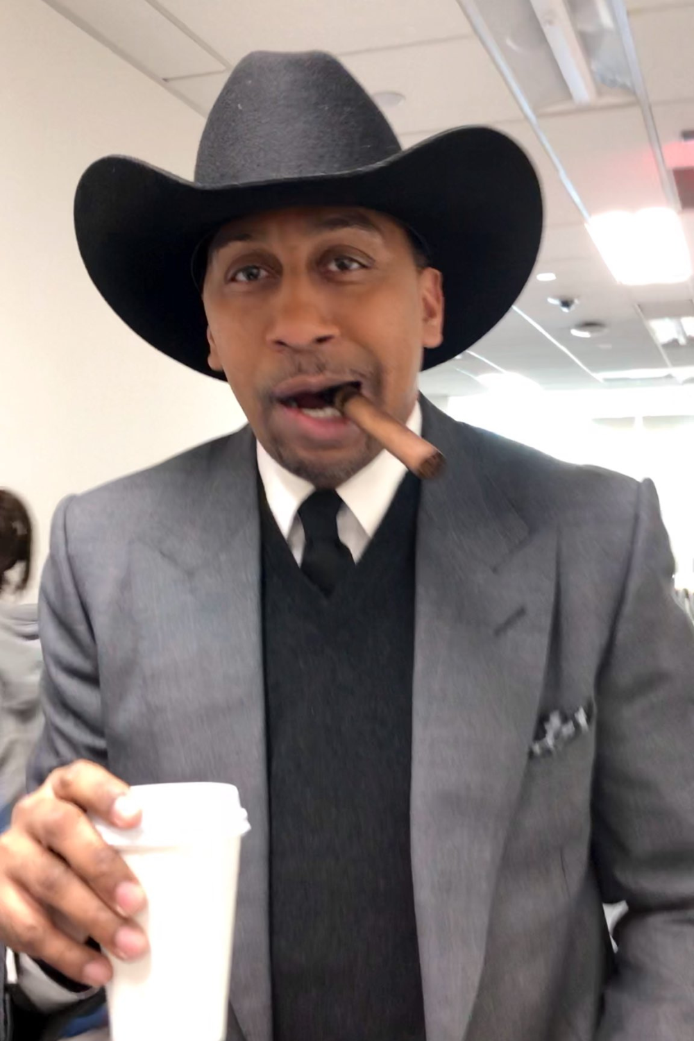 Stephen A. Smith Having His Coffee