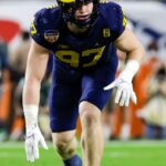 Aidan-Hutchinson-playing-for-his-college-team-Michigan-Wolverines (Source: Pride of Detroit)