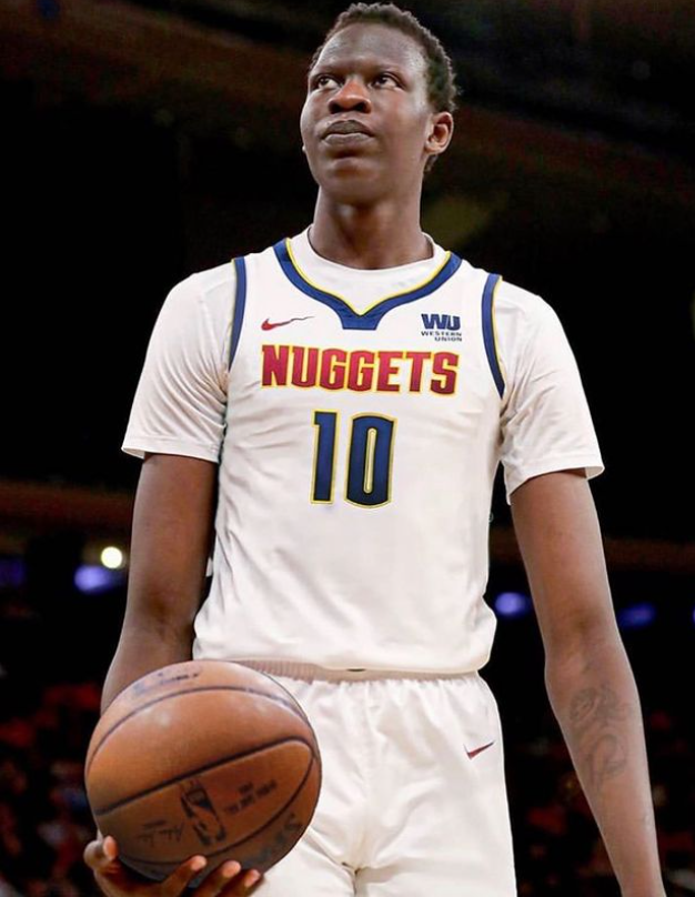 Bol Bol Wearing Denver Nuggets Jersey