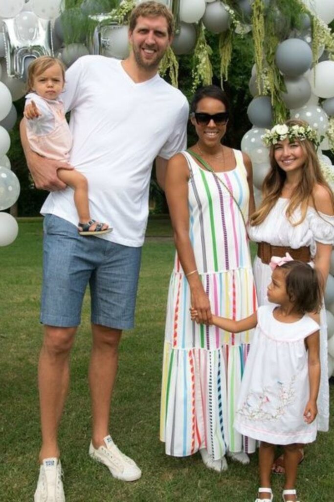 Malaika Nowitzki With Family While Her Father Holding Her