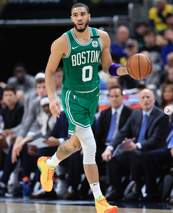 Tatum Caught In Basketball Action 