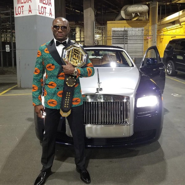 Kamaru Usman Posing With His Rolls Royce 