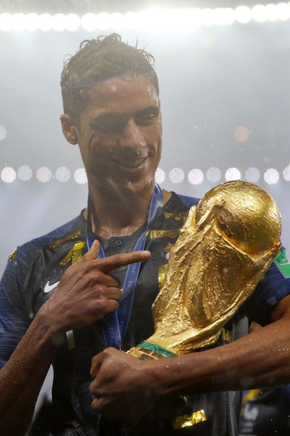 Varane With the FIFA World Cup Trophy ( Source Courtesy 90min)