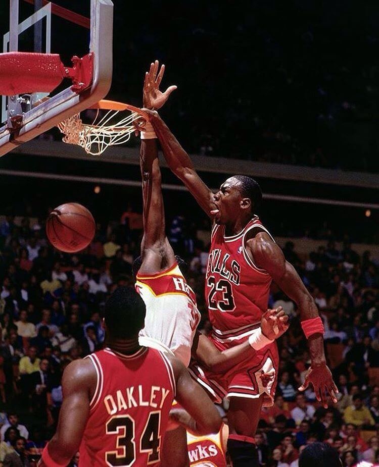 Michael Jordan dunk over Tree Rollins