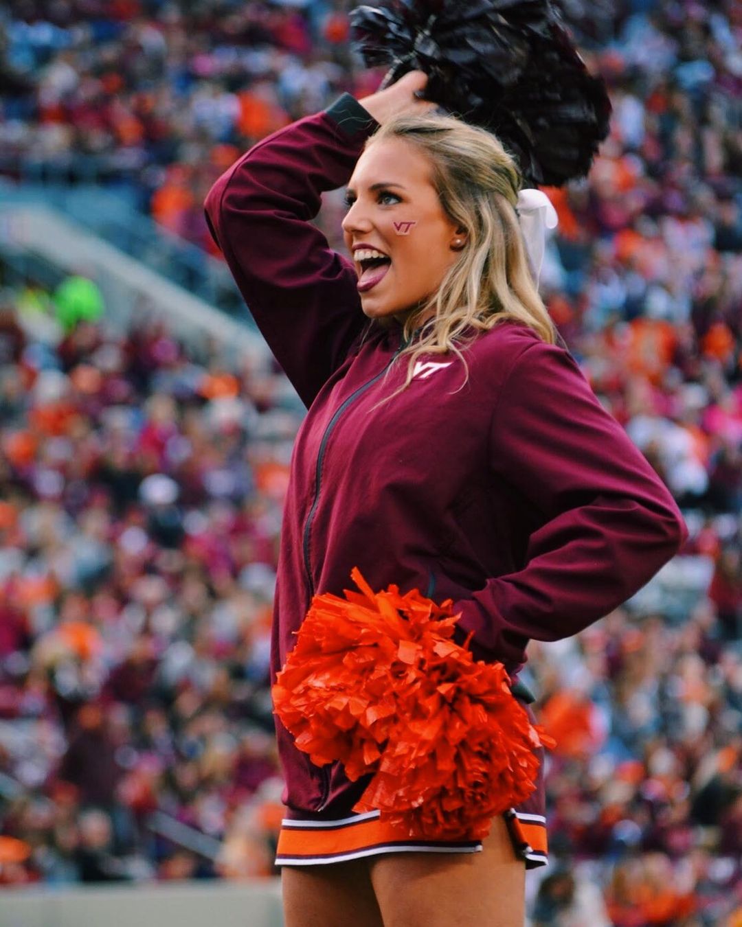 Noel Cheerleading During Her Days At Virginia Tech 