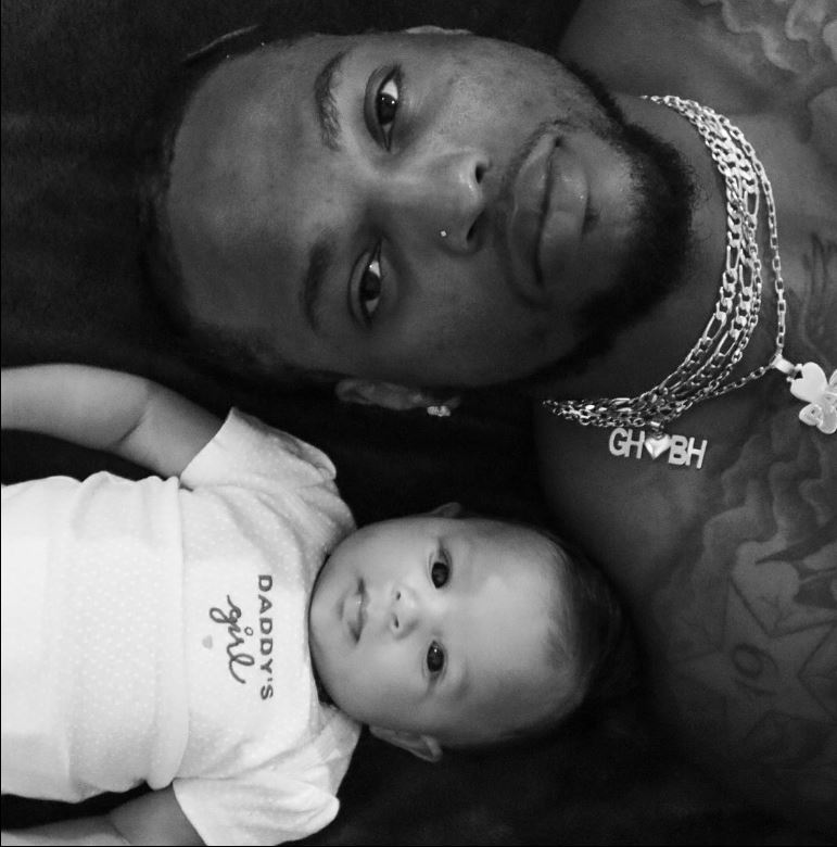 Derrick Henry and his daughter