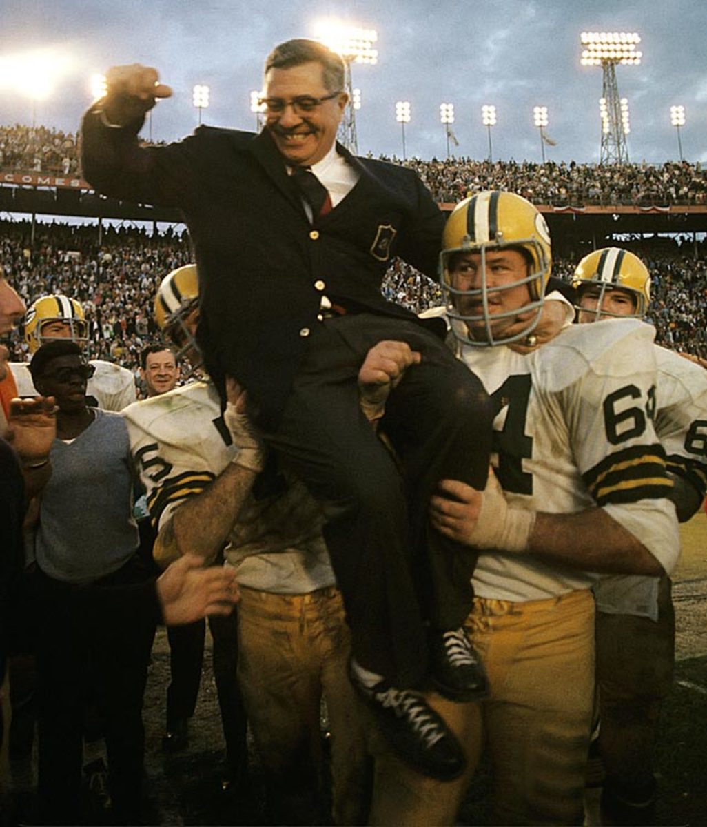 Packers celebrate with their head coach, Vince Lombardi