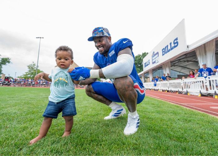 Von Miller, An NFL Player With His Son Valor