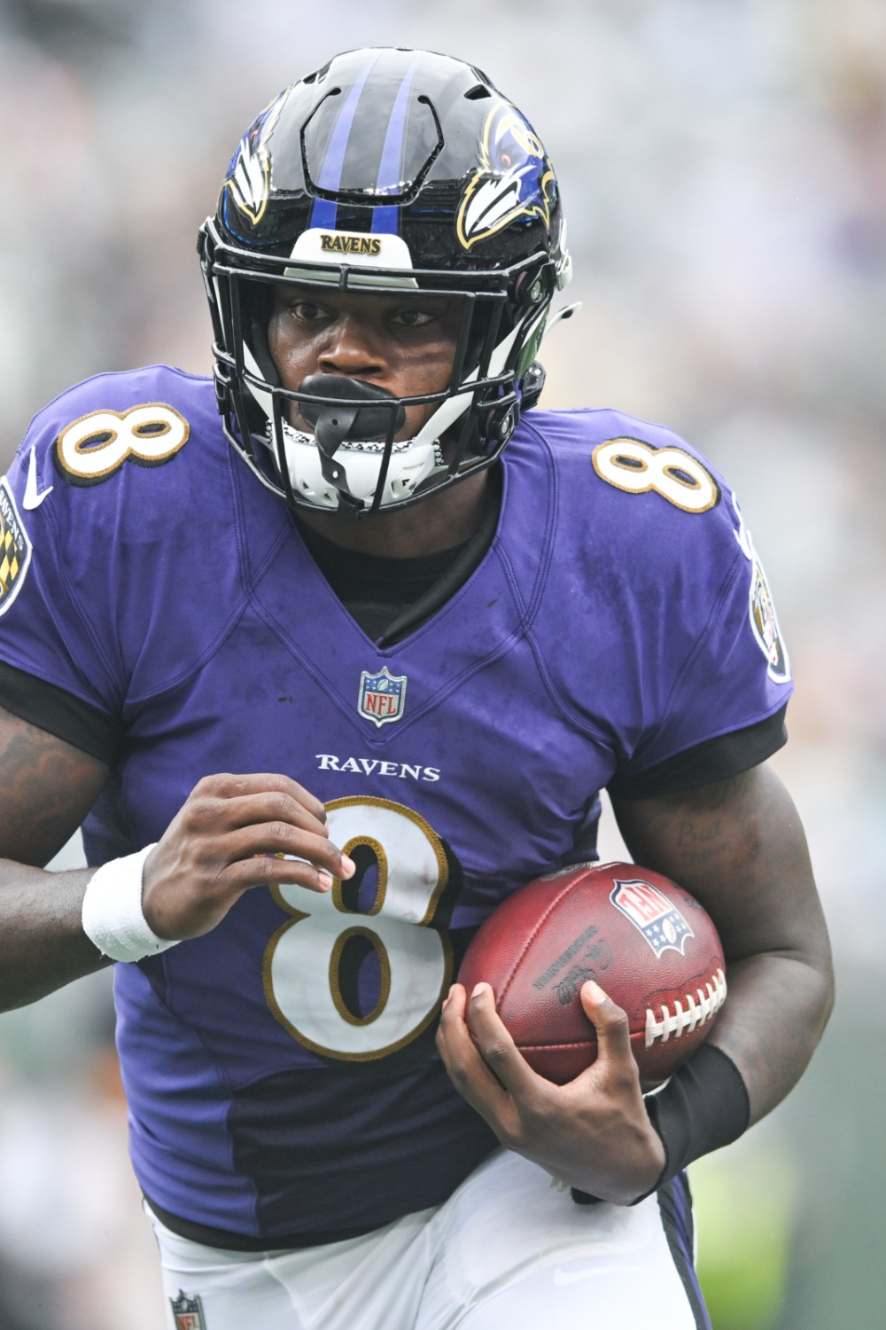 American Quarterback Lamar Running With Ball 