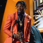 Jackson Posing With His MVP Awards