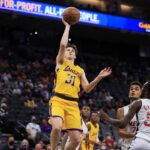 Austin Reaves playing for the Lakers