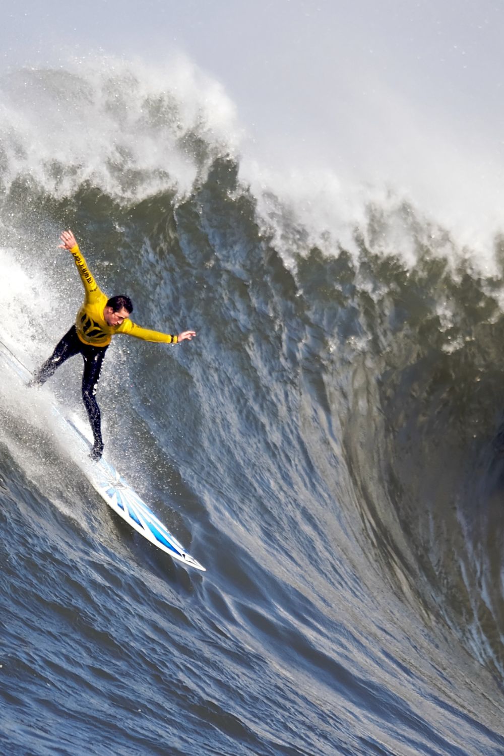 Surfer Surfing In The Big Waves