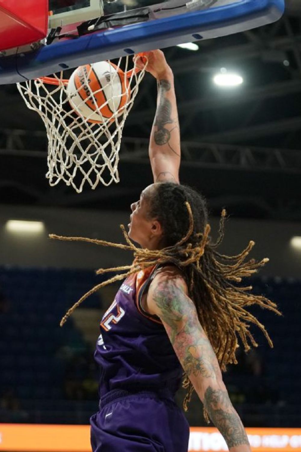 WNBA Player Dunking A Ball 