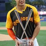 Giancarlo Stanton poses with the trophy for winning the 2016 Home Run Derby.