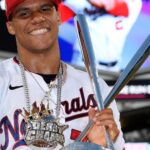 Baseball Player Showing His MLB Home Run Derby Trophy