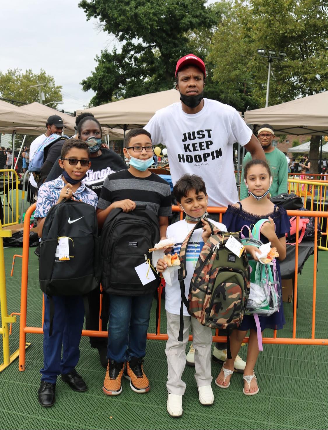 Louis King Providing School Supplies And Backpacks