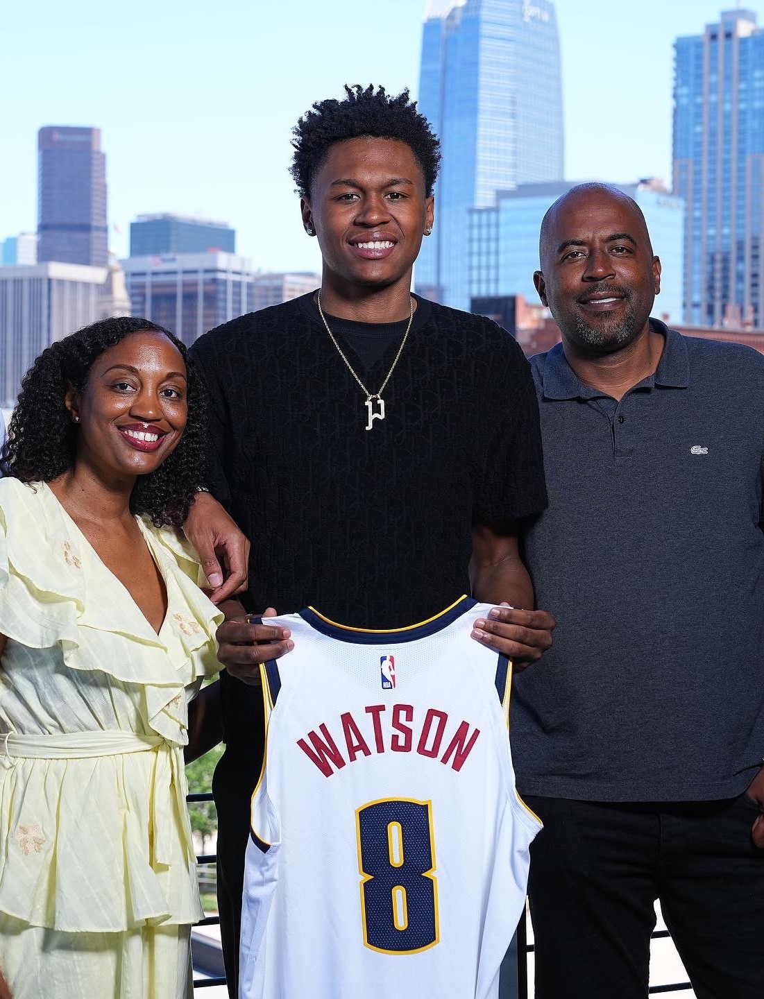 Peyton Watson with his father and mother