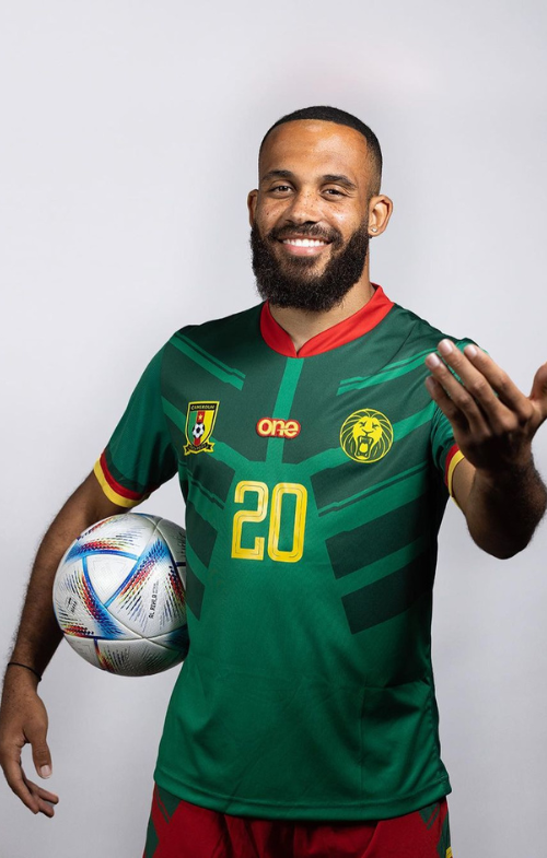 Bryan Mbeumo Holding Ball And Smiling