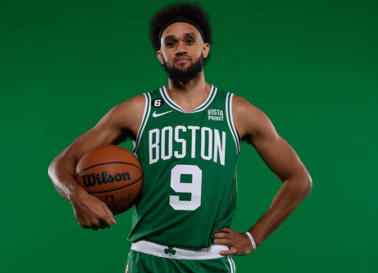 Derrick White Holding Basketball